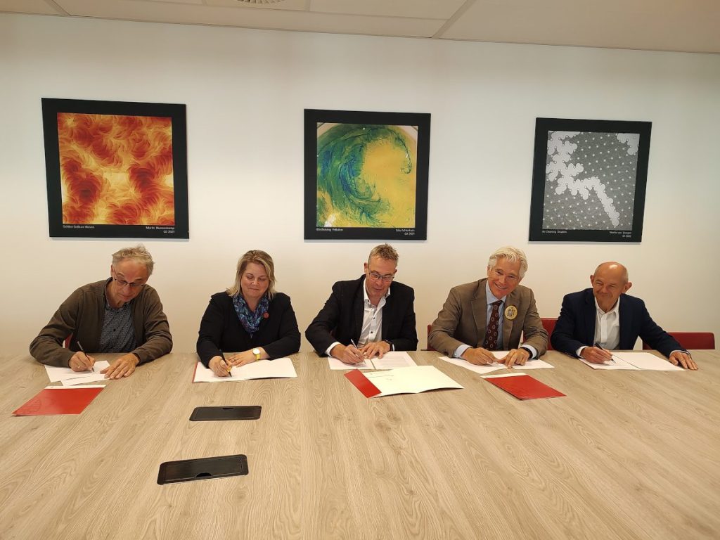 Signing the Mission 10x partner agreement